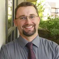 Adam Huck headshot