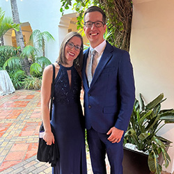 Justin Niebel smiles with woman