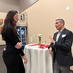 A student listens to a professional speak.