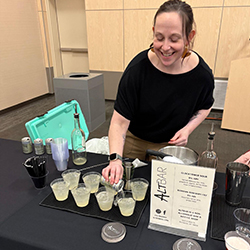 Meg Hartman pours a mocktail.