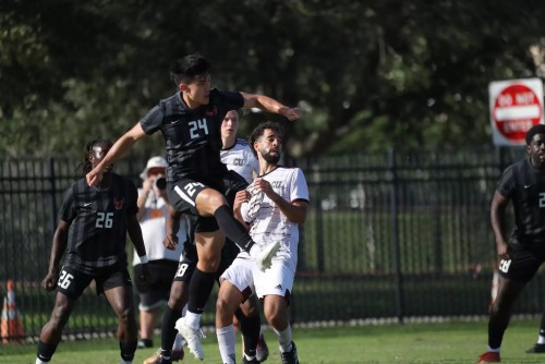 Noah jumps during a soccer game