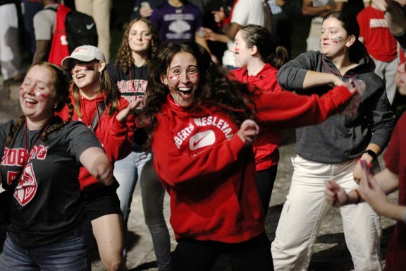 A student celebrating