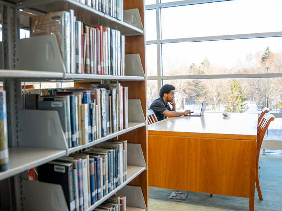 A male student studying 