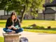 Student reads outside