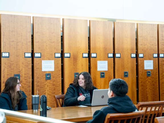 three students working together